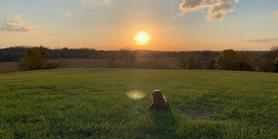 Girl watching the sunset